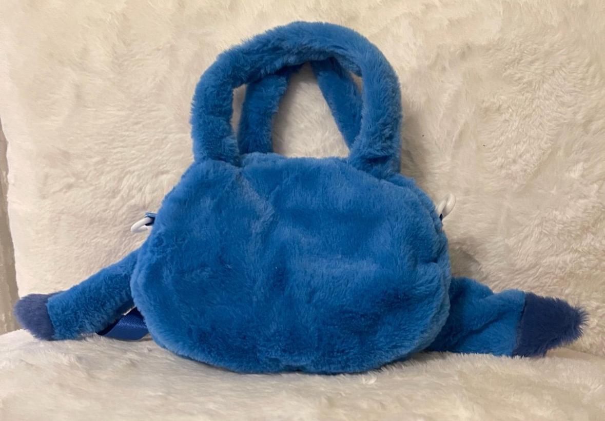 Cartera de peluche azul Stitch