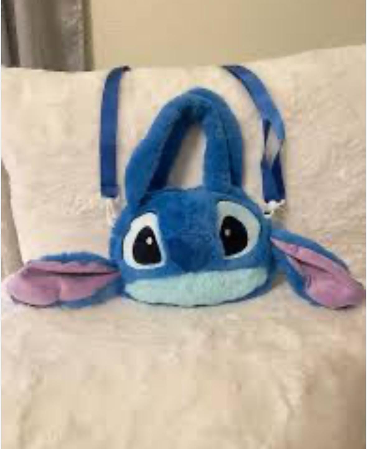 Cartera de peluche azul Stitch