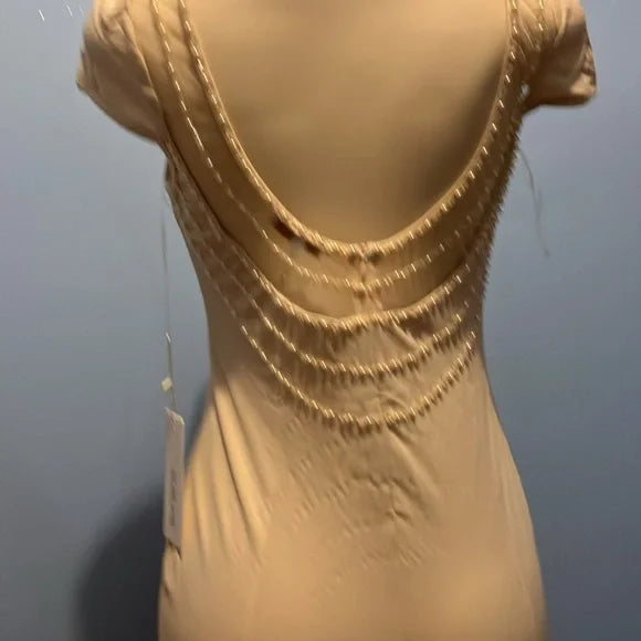 Elegant Beige Dress with Beaded Detail