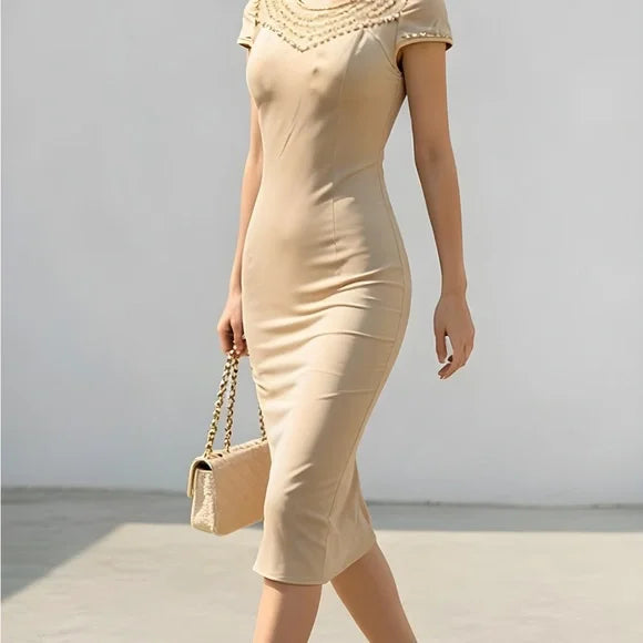 Elegant Beige Dress with Beaded Detail