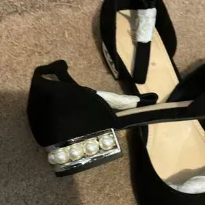 Black shoes with belts